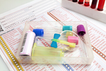 Blood sampling kit. vaccum tube for testing, empty blood testing in the laboratory. kit Hematology blood analysis with medical report and collection tubes in the lab