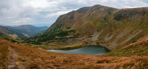 Lake in the mountains. Place for rest and camping. Brebenskul, Carpathians