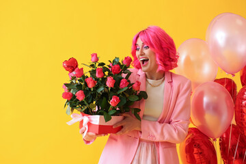 Excited woman with bright hair, bouquet of flowers and air balloons on color background. Valentine's Day celebration