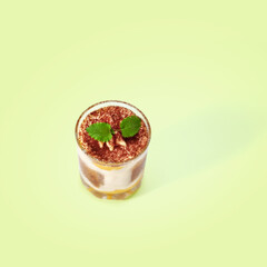 Traditional Italian dessert tiramisu in a glass