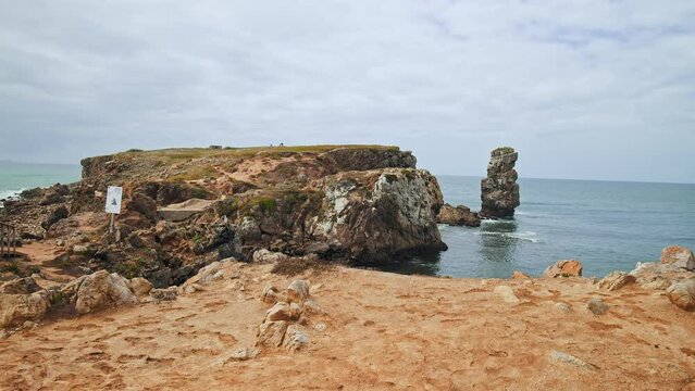 Ilheu da Papoa - beautiful rock formation coast in Peniche, Portugal near Lisbon. Pap&ocirc;a - Peniche - Stunning Portuguese coastal with cliffs and blue ocean water.