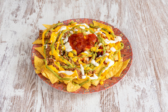 Nachos Are A Dish Of Mexican Origin, Which Consist Of Frying Pieces Of Corn Tortilla Covered With A Special Cheese Called 