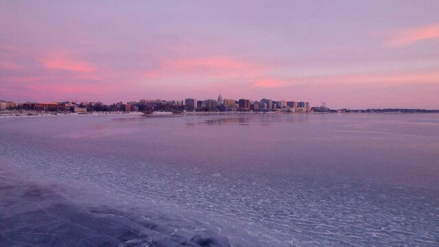 Frozen sunrise on an ice covered Lake Monona, Madison, WI. 