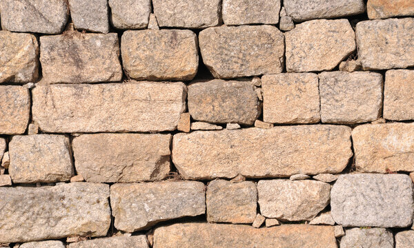 Textura de pedras de um muro r&uacute;stico