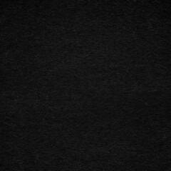 Black paper or cardboard texture as background