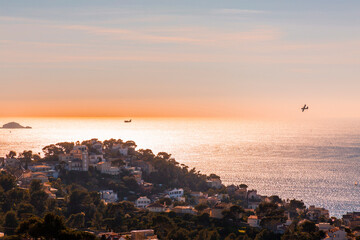 Beautiful horizon view with golden sunlight from the coast of Marseille