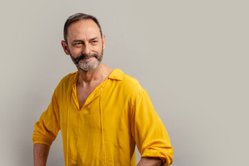 Stylish handsome grey bearded senior on casual clothes