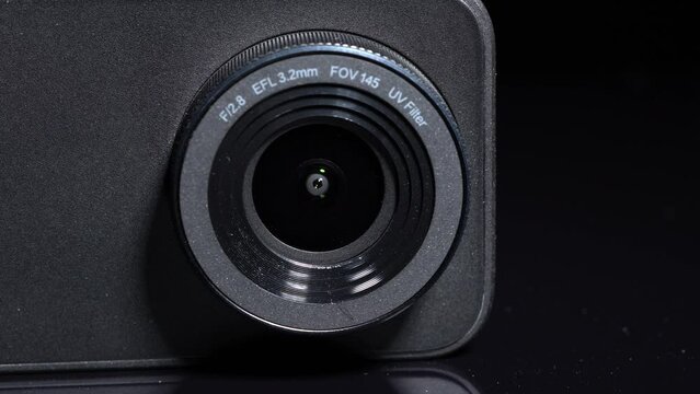Action 4k resolution mini camera for sport and activity footage. Selective focus. Videography and photography, gear and gadget for active lifestyle for travelers and sport people.