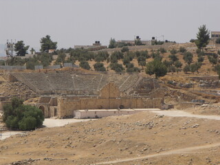 Jerash, Jordan, August 8, 2010: Remains of the stone amphitheater in the Roman city of Jerash,...