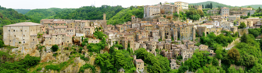 Fototapeta na wymiar Rooftops of Sorano, an ancient medieval hill town hanging from a tuff stone over the Lente River.