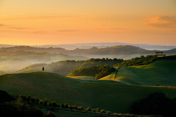 Stunning morning view of fields and farmlands with small villages on the horizon. Rural landscape...