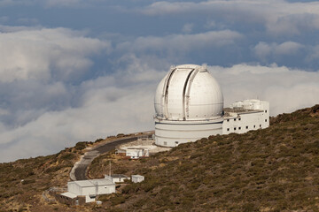 Obraz premium LA PALMA, CANARY ISLANDS, SPAIN - November 08, 2021. Big telescope at highest peak of La Palma, Spain