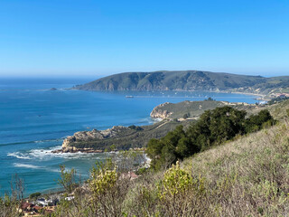 Fototapeta na wymiar Looking down from mountain top at San Luis Obispo Bay, Pirates Cove, and Shell Beach California.