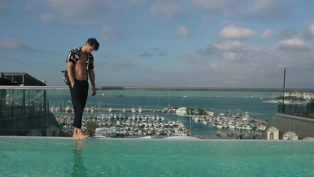 man walking on the background of the marina