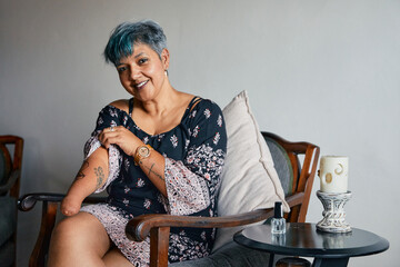 Woman with one hand holding a dress