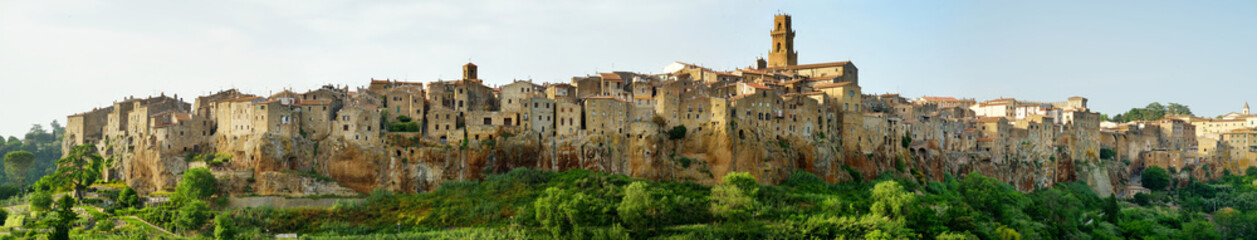 Pitigliano town, located atop a volcanic tufa ridge, known as the little Jerusalem, surrounded by lush valleys carved by the Lente and Meleta rivers.