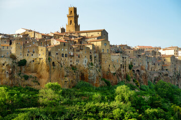 Fototapeta premium Pitigliano town, located atop a volcanic tufa ridge, known as the little Jerusalem, surrounded by lush valleys carved by the Lente and Meleta rivers.