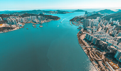 Fototapeta premium Panoramic aerial view of Hong Kong city in Orange and Teal color tone