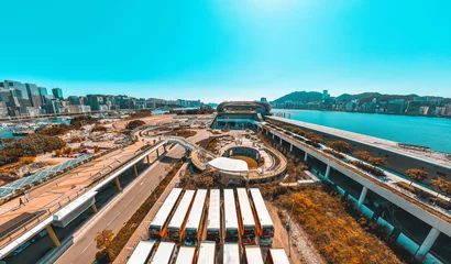 Photo sur Plexiglas Pool Vue aérienne panoramique de la ville de Hong Kong dans les tons orange et bleu sarcelle