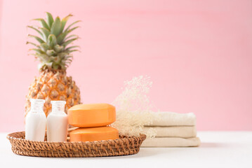 Obraz na płótnie Canvas Pineapple from local market on pink background, summer vacation beach and natural spa beauty idea