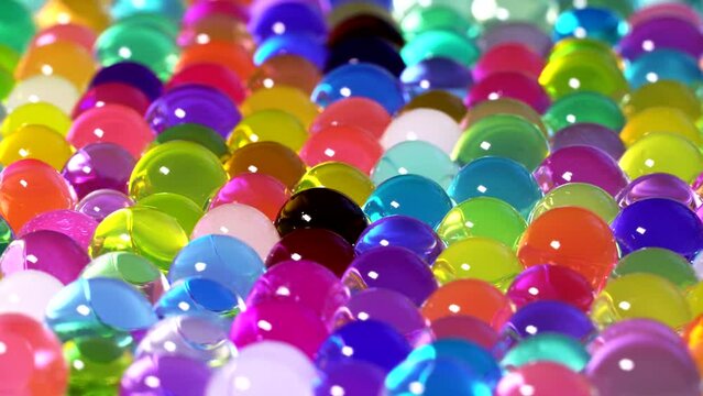 Colorful hydrogel balls rotation background