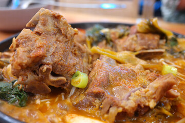 big chunk of meat in Korean hangover soup.