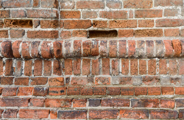 Old historical weathered brick fortress wall texture