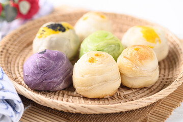 Chinese pastry stuffed with many sweet such as mung bean, egg yolk or custard