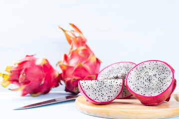 Fresh dragon fruit or pitaya cutting on wooden board, Tropical fruit