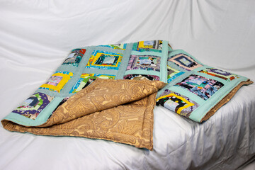 Patchwork quilt handmade. Home creativity.