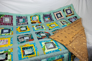 Patchwork quilt handmade. Home creativity.