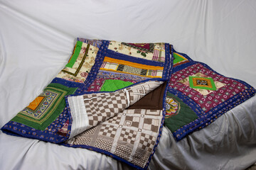 Patchwork quilt handmade. Home creativity.
