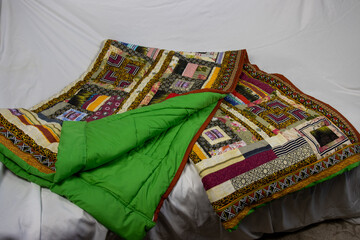 Patchwork quilt handmade. Home creativity.