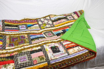 Patchwork quilt handmade. Home creativity.