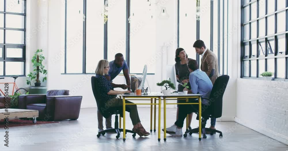 Poster Every team members input is valuable. Diverse group businesspeople working together in a modern office. Group of businesspeople collaborating and brainstorming together in the office using computers