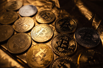 Bitcoin Cryptocurrency Gold Coins in the golden background