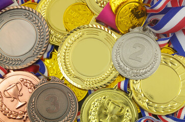 Gold, silver and bronze medals as background