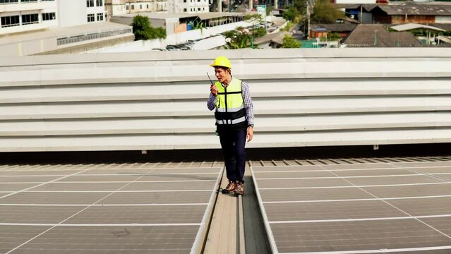 Inspection Engineer Checking Solar Panel Installation On Roof Top. 