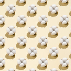 Cotton pattern on a light beige background.