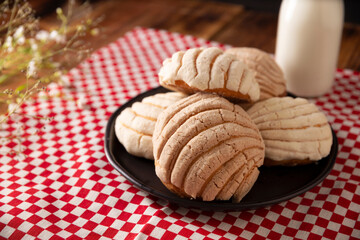 Conchas. Mexican sweet bread roll with seashell-like appearance, Usually eaten with coffee or hot chocolate at breakfast or as an afternoon snack.