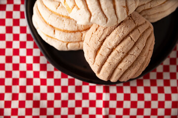 Conchas. Mexican sweet bread roll with seashell-like appearance, Usually eaten with coffee or hot chocolate at breakfast or as an afternoon snack.