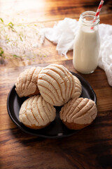 Conchas. Mexican sweet bread roll with seashell-like appearance, Usually eaten with coffee or hot chocolate at breakfast or as an afternoon snack.