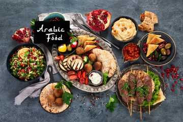 Fototapeta na wymiar Arabic food assortment on dark background.