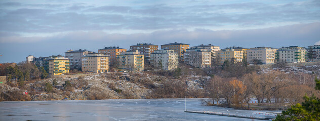 Apartment houses at the waterfront of the district island Kungsholmen skyline with functionalist...