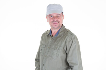 Happy man wearing a beige military cap in white background