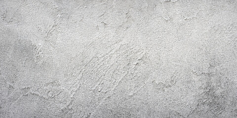 コテ後の残るコンクリートの壁の背景テクスチャー
