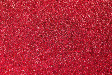 Red glitter background. Sparkle texture. Abstract twinkle background for Valentine or Christmas...