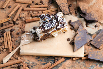 a multi-layered cake made of chocolate and cream cakes