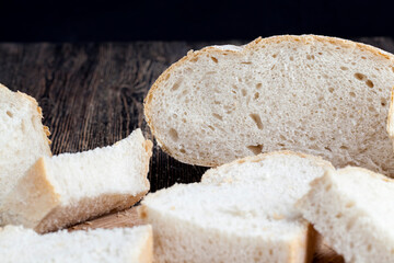 sliced pieces of gray bread from second-rate flour