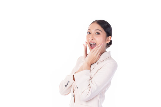 Image of feeling excited, shock, surprise and happy. Young asian woman standing isolated on white background. Female face expressions and emotions body language concept.